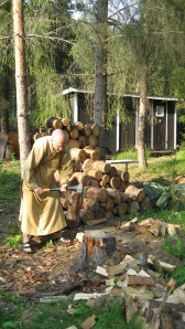 Rev. Heng Sure chopping wood in Finland